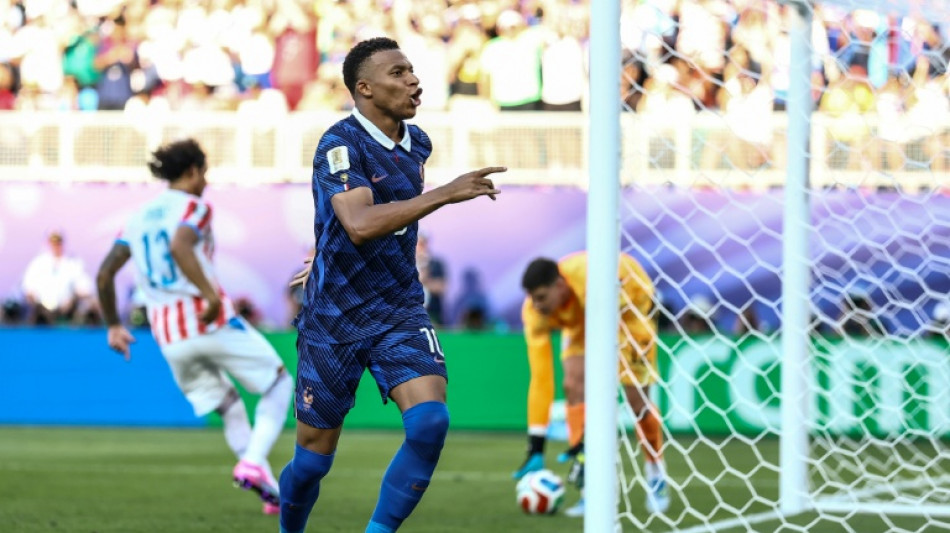 France battle past Paraguay to set up Morocco World Cup showdown