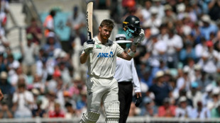 Ton-up Phillips stars for New Zealand against England