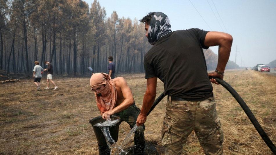 Rain dampens France fire, as Spain reports 'almost no flames'