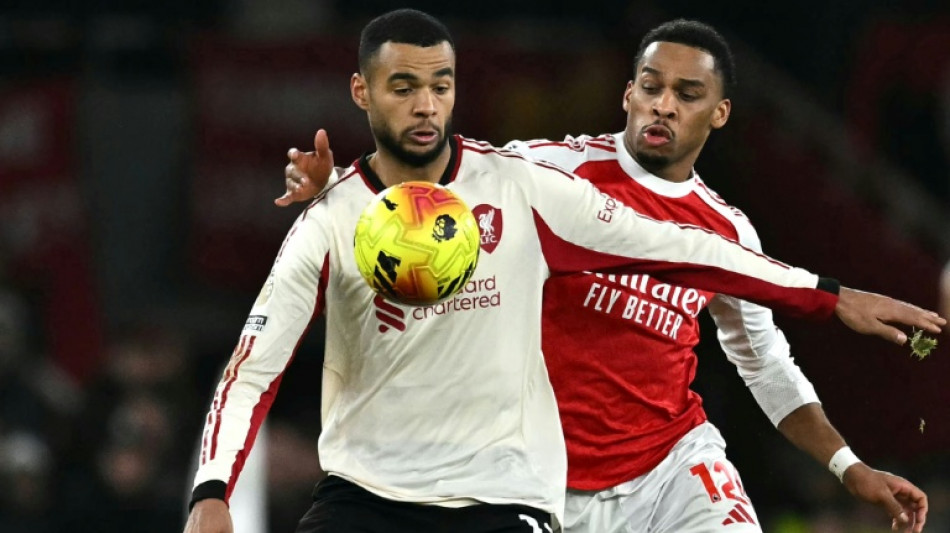 Arsenal miss chance to stretch lead in Liverpool stalemate