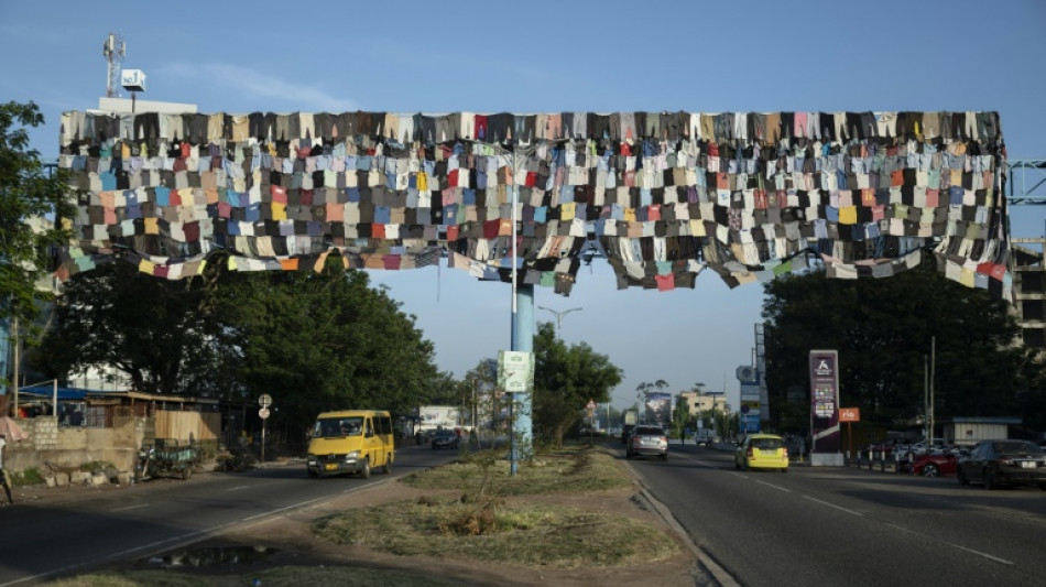 Ghana artist's billboard campaign takes aim at fast fashion fallout