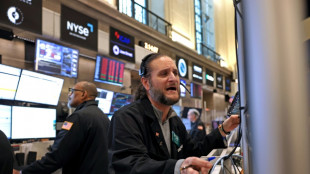 Panique boursière mondiale: chute limitée à Wall Street