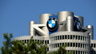 BMW profit down a third as carmaker plans job cuts
