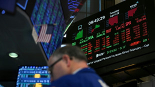 Wall Street ouvre en baisse, minée par l'image d'une économie américaine vacillante