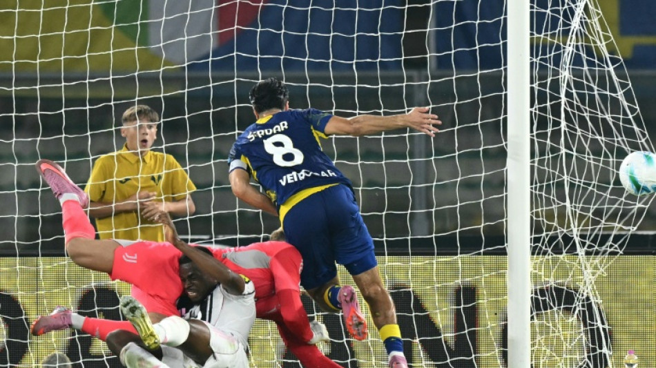 Juventus climb top in Italy with draw at Verona 