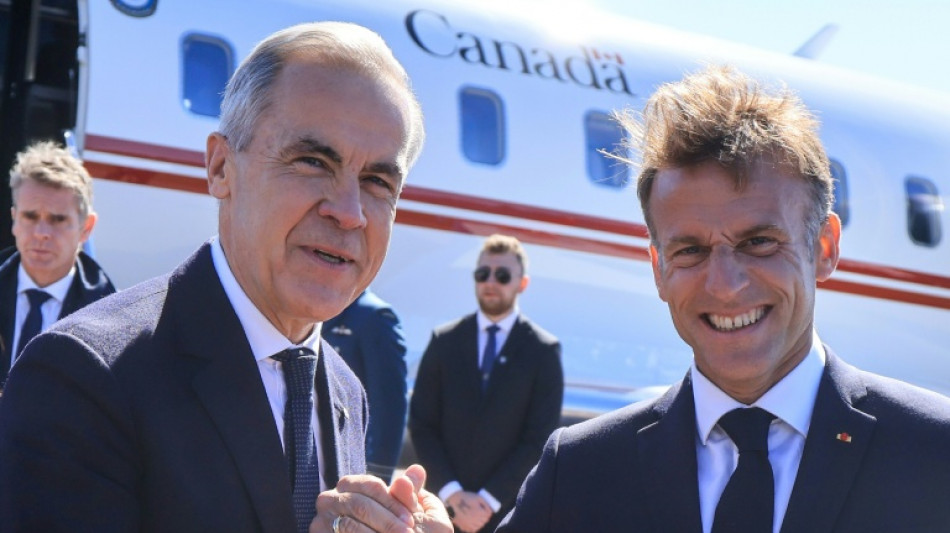 Frankreichs Pr&auml;sident und Kanadas Regierungschef treffen sich in &Uuml;berseegebiet