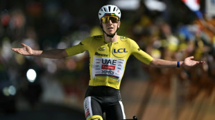 Pogacar extends Tour de France lead with  
Alpe d'Huez win
