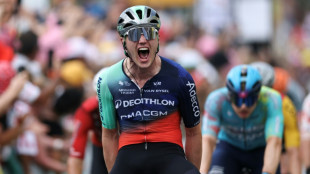Kooij wins Tour de France 5th stage in chaotic sprint finish