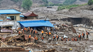 Death toll from northwest China floods rises to 13