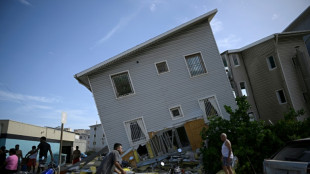 Venezuelans trapped alive after twin quakes kill at least 164