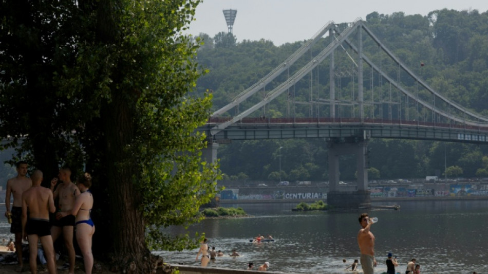 Escaping heat, forgetting war: Kyiv locals hit the beach