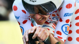 Pogacar plays down yellow jersey after Evenepoel wins Tour time trial