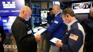 Triple record à Wall Street, poussée par les perspectives de baisses des taux