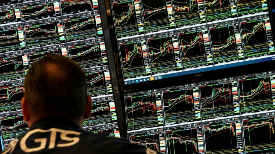 Wall Street termine dans le vert, rassur&eacute;e sur les droits de douane