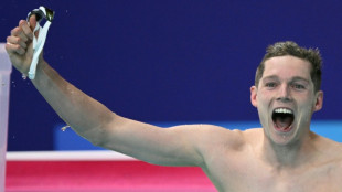 Scotland's Scott splits Australian swim dominance at Commonwealths