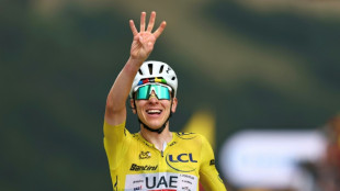 Pogacar wins Tour de France 14th stage to extend overall lead