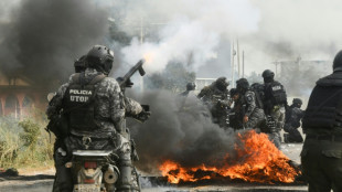 Police, protesters clash in Bolivia at road blockade