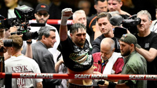 Usyk says vacating heavyweight world title belts