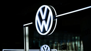 Volkswagen profits skid on one-off costs, China competition