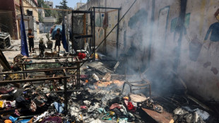 Des Gazaouis sous le choc après une frappe israélienne sur une école transformée en refuge